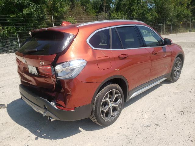 VIN WBXHT3C38J5K32077 2018 BMW X1
