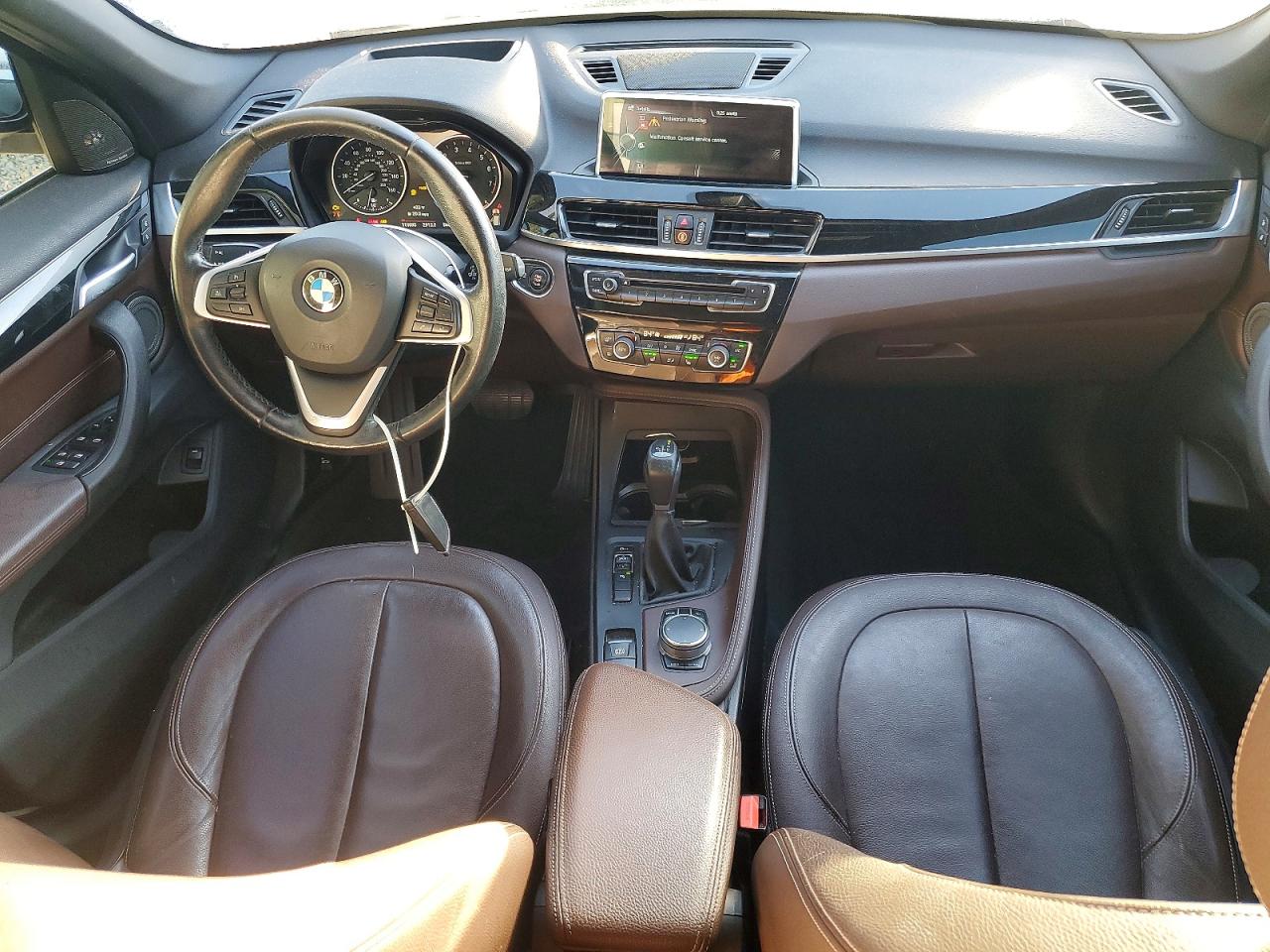VIN WBXHU7C3XH5H35983 2017 BMW X1 SDRIVE2