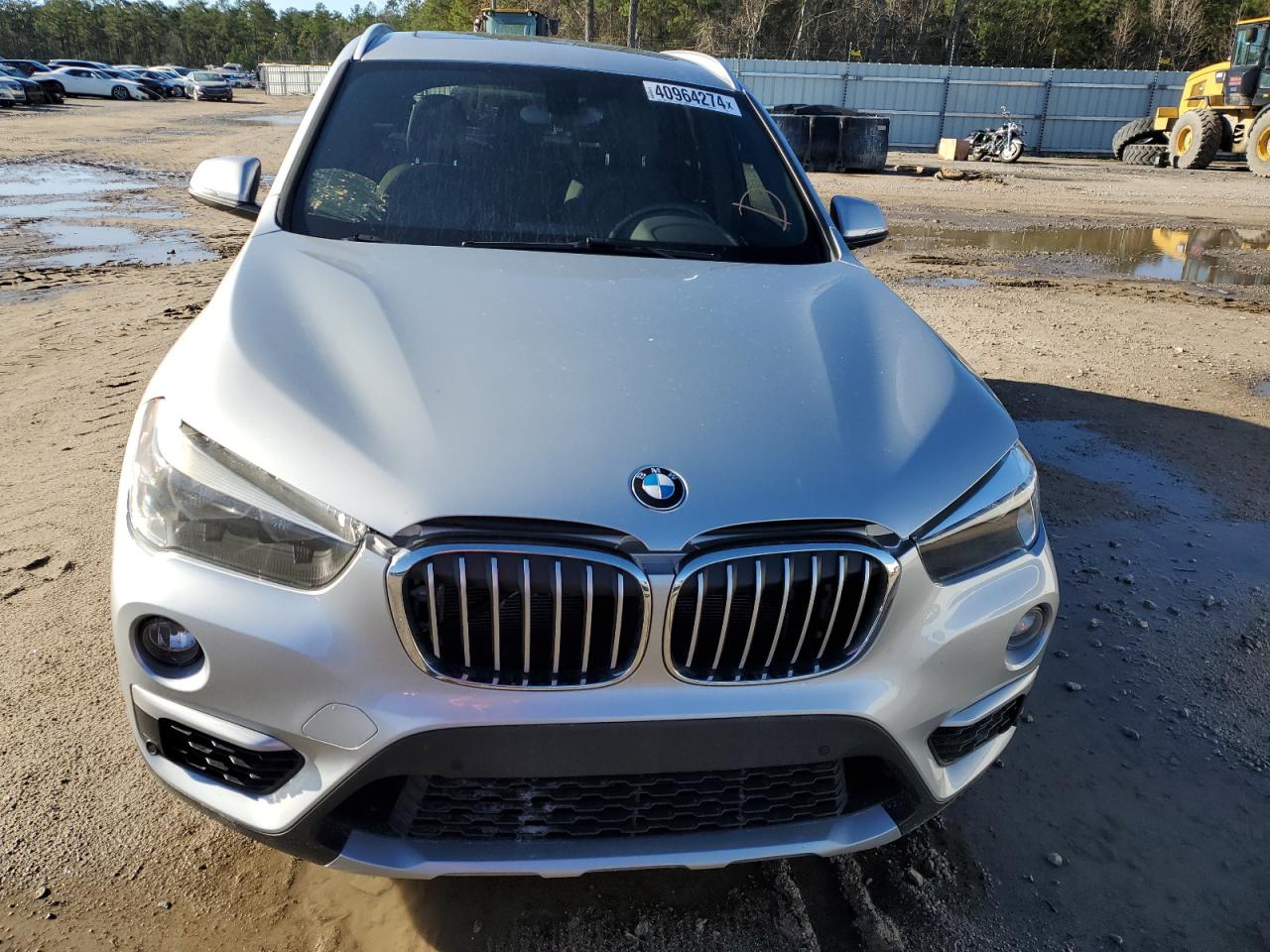 VIN WBXHT3C38H5F77056 2017 BMW X1