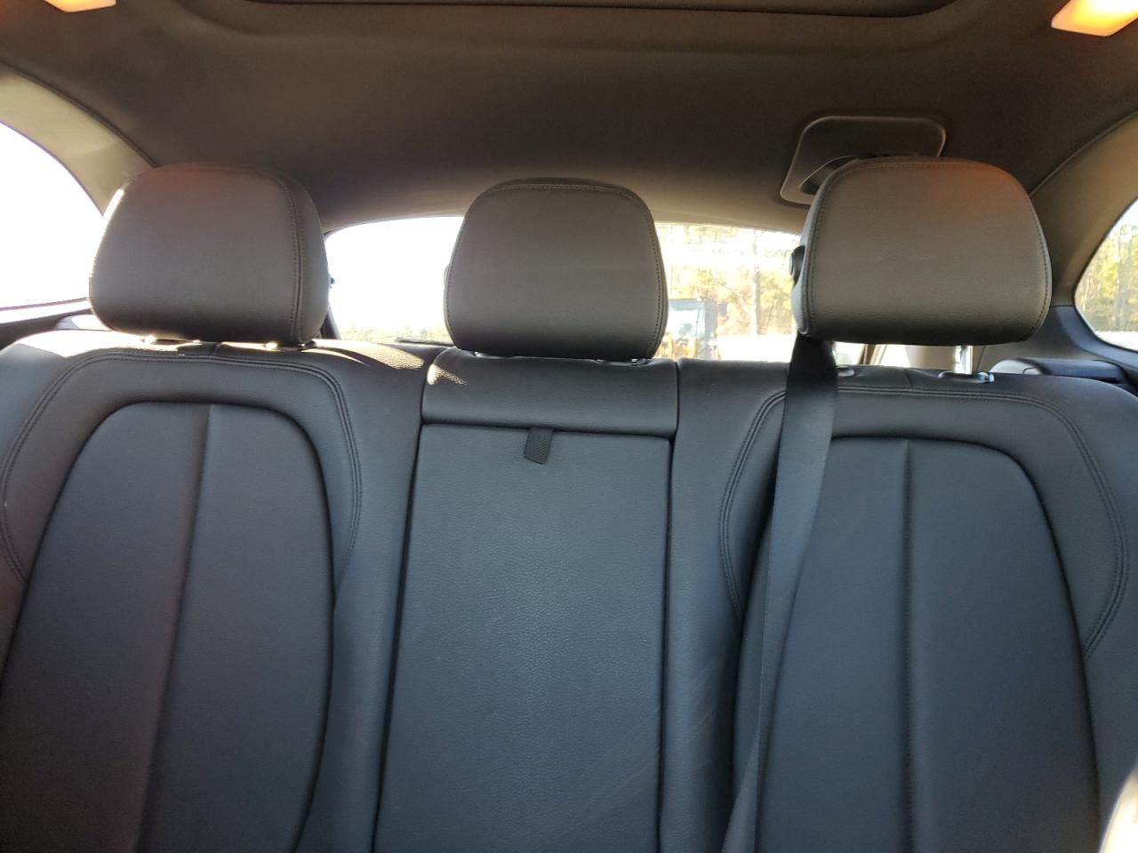 VIN WBXHT3C38H5F77056 2017 BMW X1