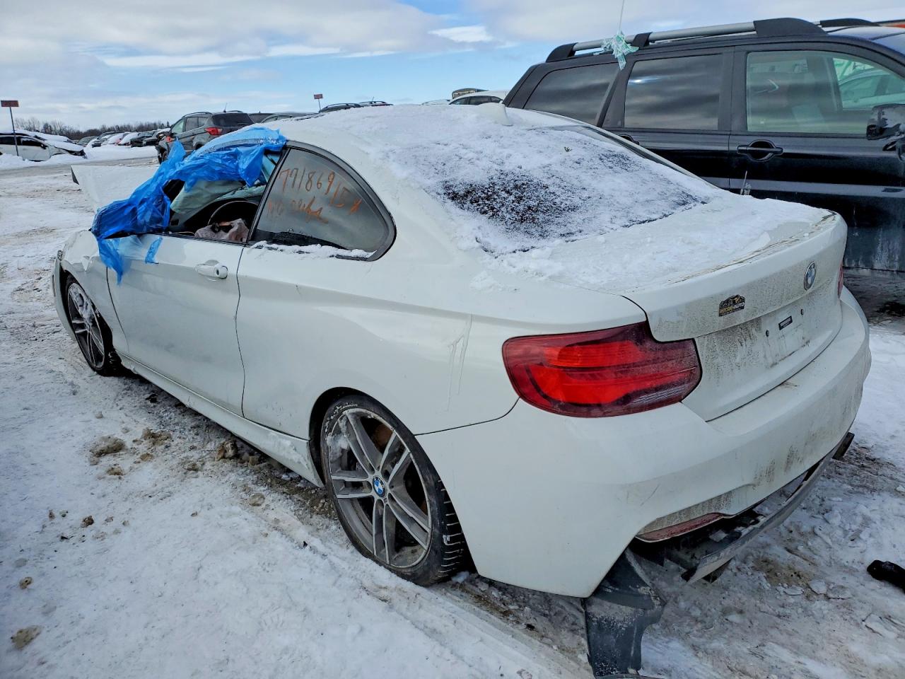 VIN WBA2J7C03M7G76997 2021 BMW M240XI